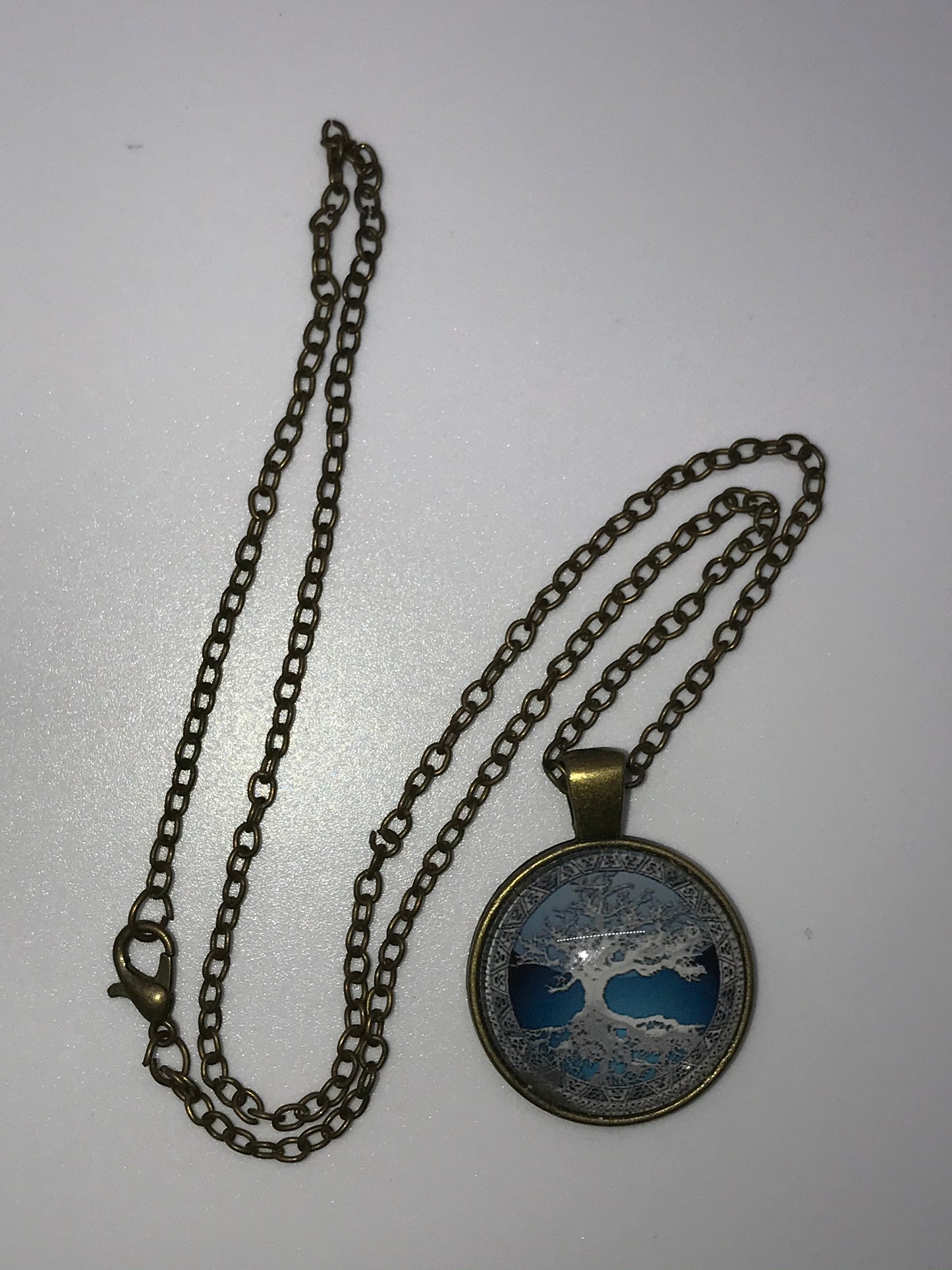 18" Blue Tree and Reflection Brass Necklace