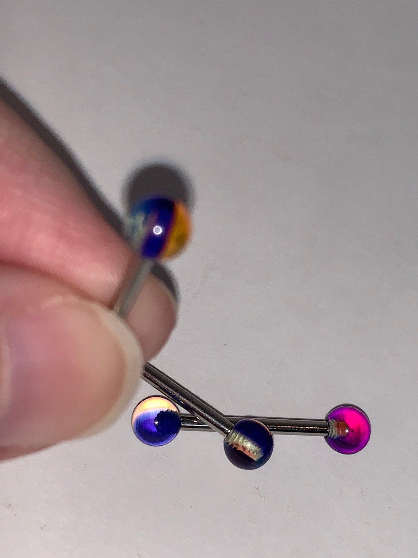14 Gauge Purple, Clear and Orange Striped Tongue Ring