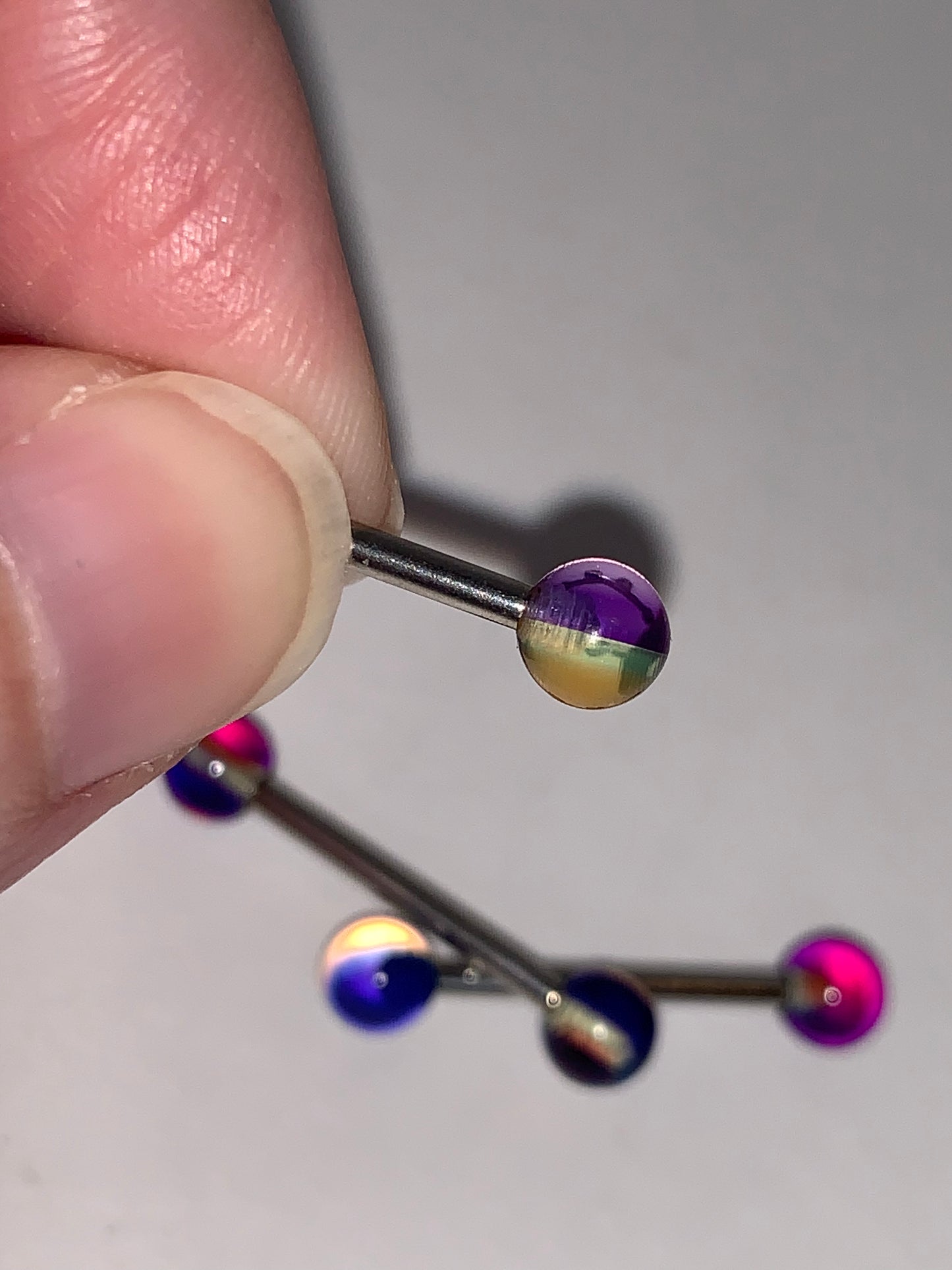 14 Gauge Purple, Clear and Orange Striped Tongue Ring