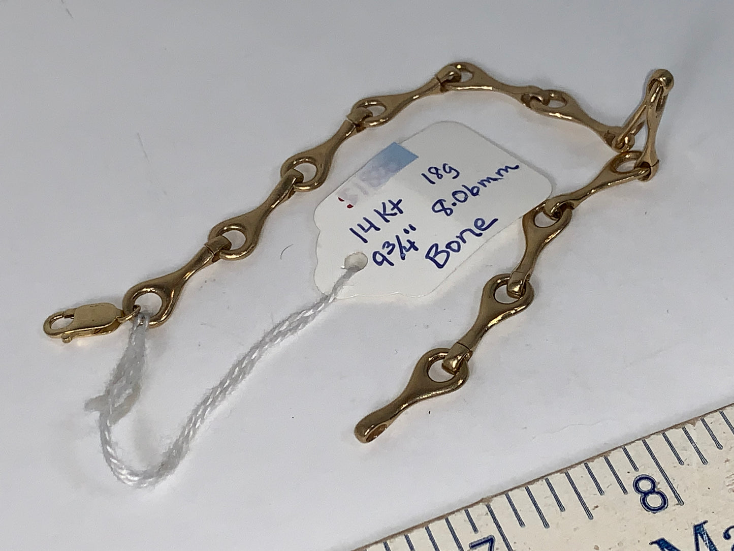 9 3/4" long 14KT Gold Bone Design Bracelet