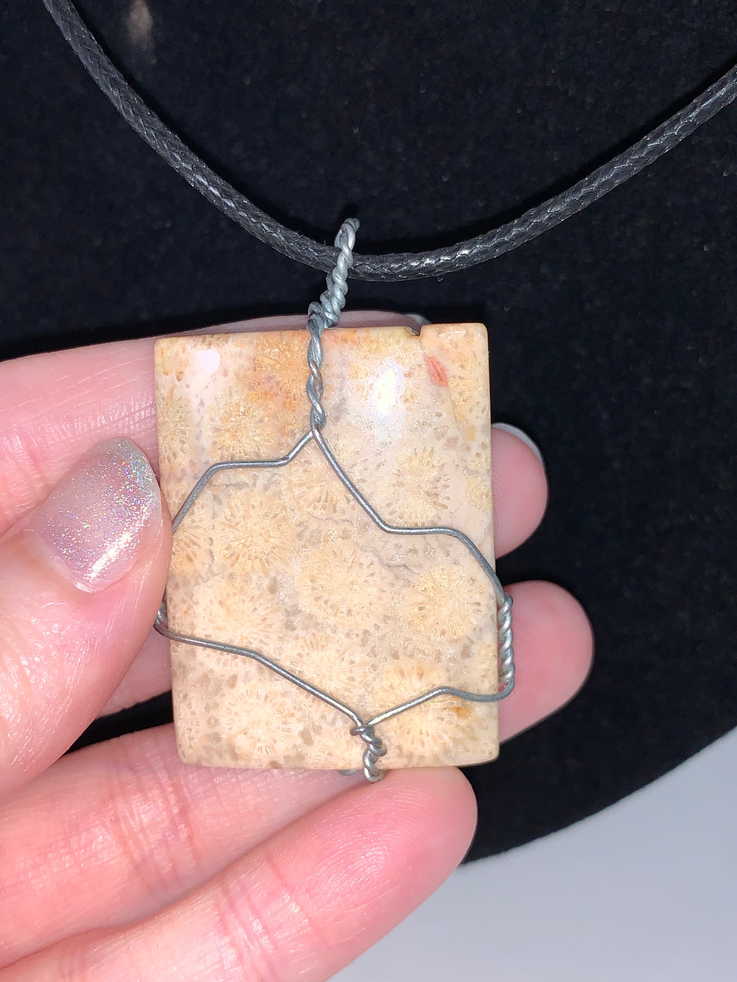 20" Braided Leather necklace with Wire wrapped Fossilized Coral Pendant