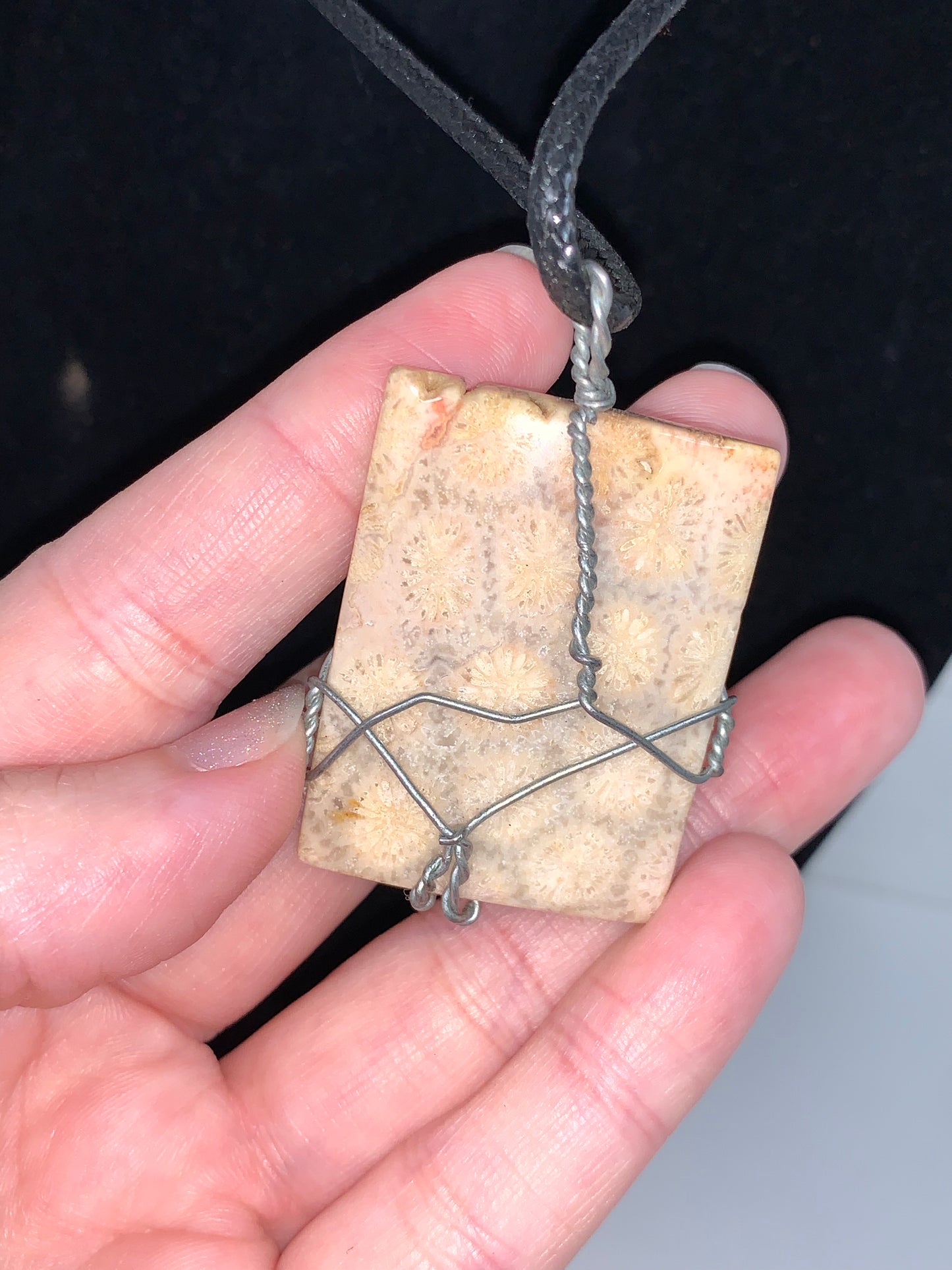 20" Braided Leather necklace with Wire wrapped Fossilized Coral Pendant