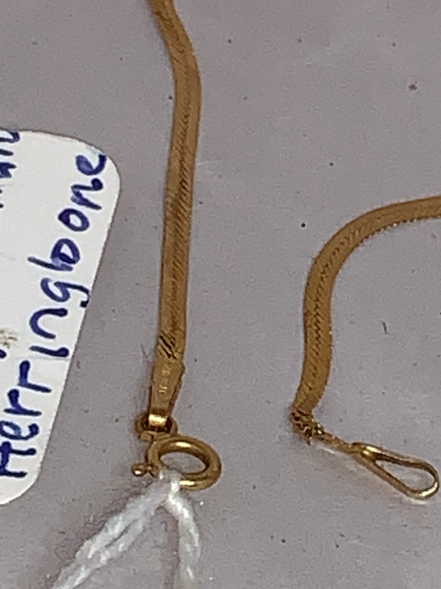 7 1/2" long 14 Kt Gold Herringbone Bracelet