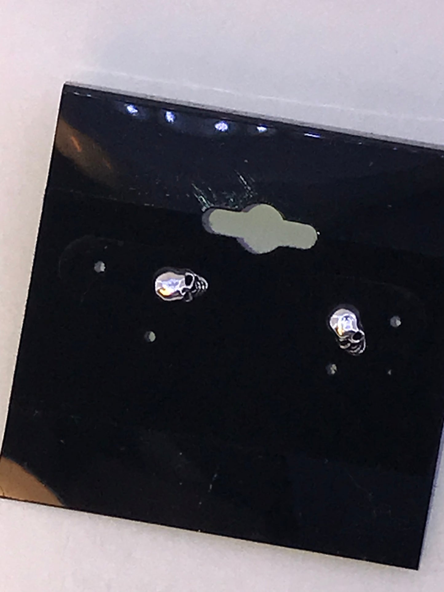 Tiny Sterling Silver Skull Post Earrings