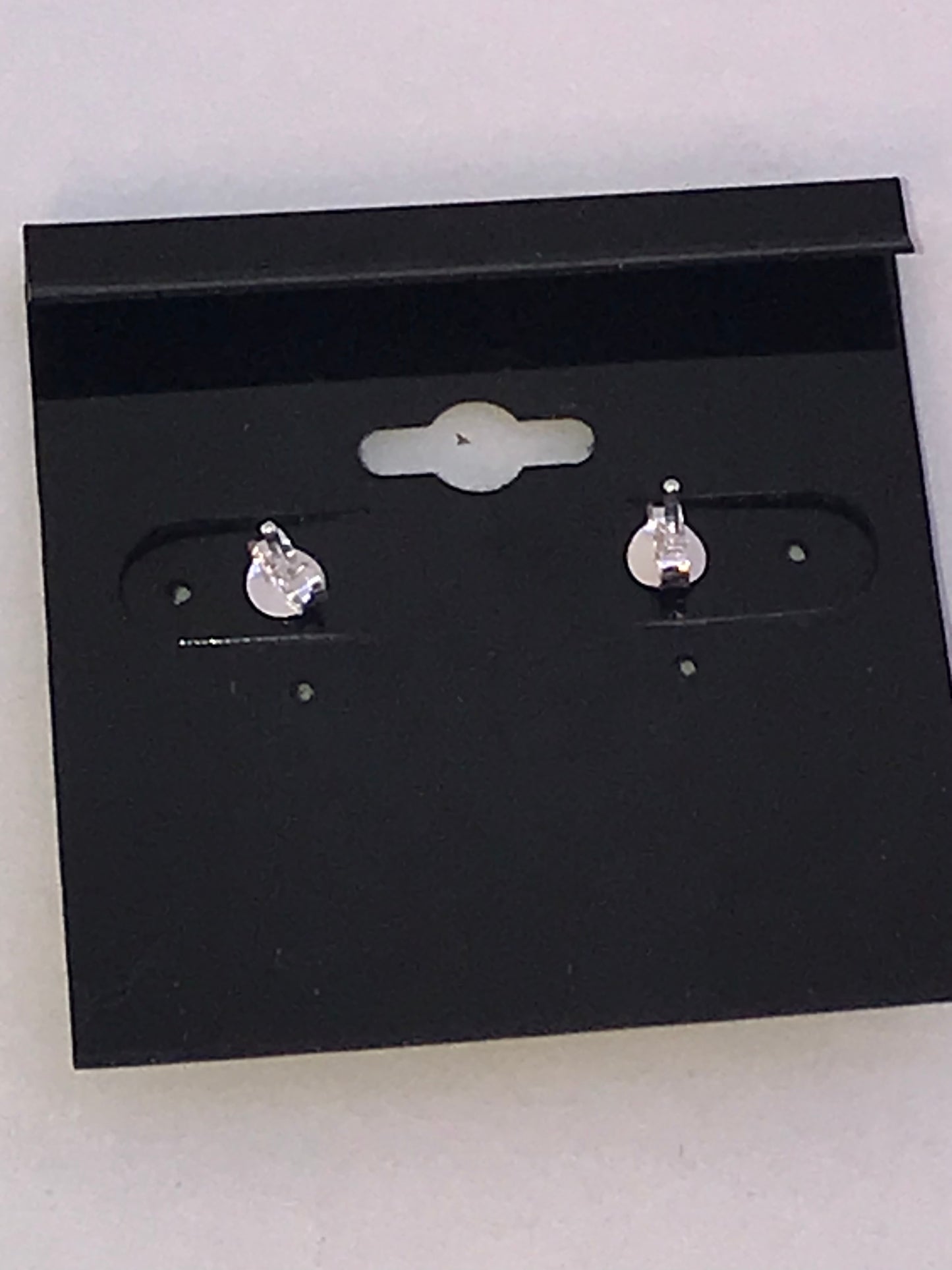 Tiny Sterling Silver Skull Post Earrings