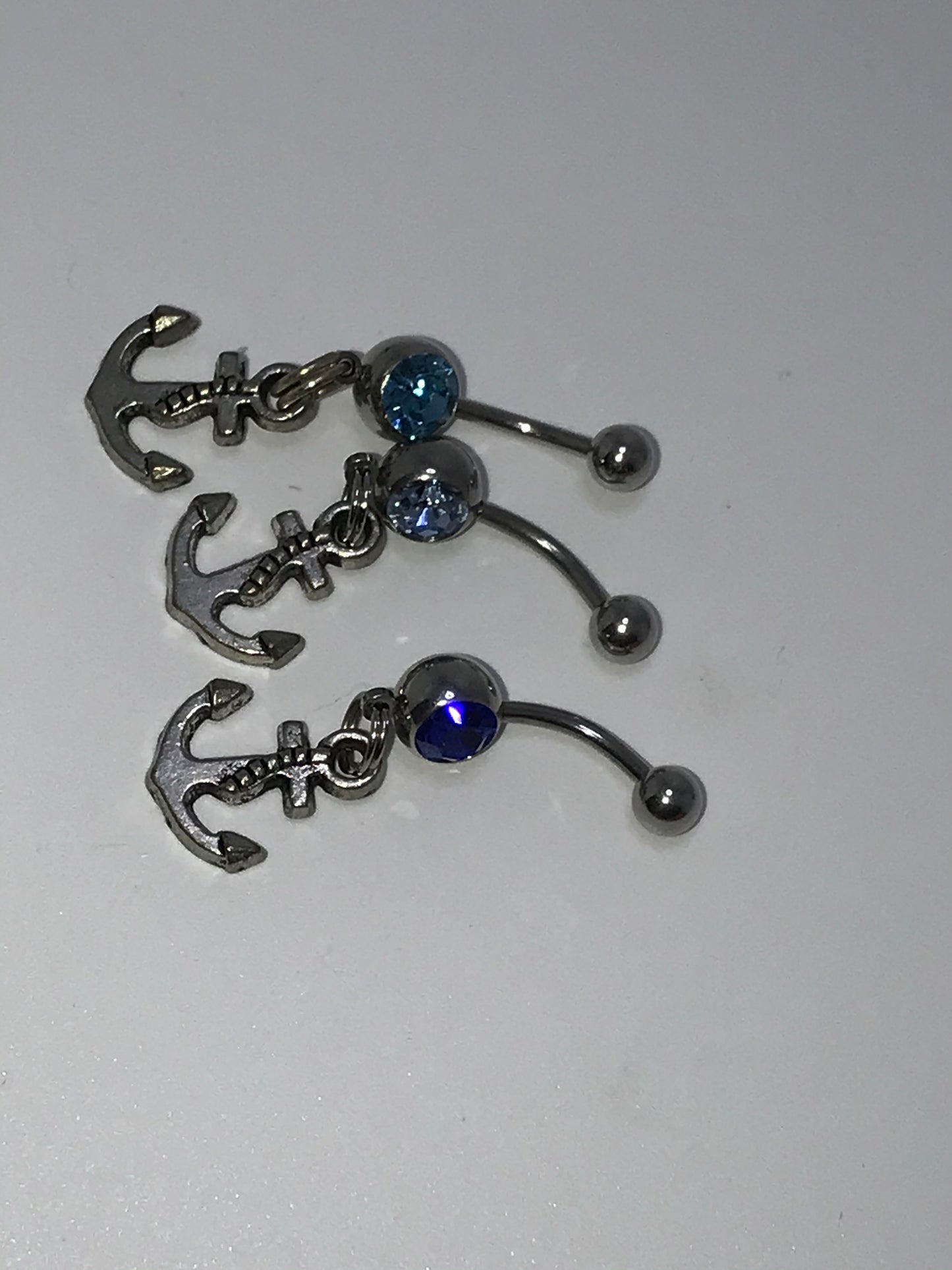 Small Anchor with Light Blue Gem Dangle Belly Ring