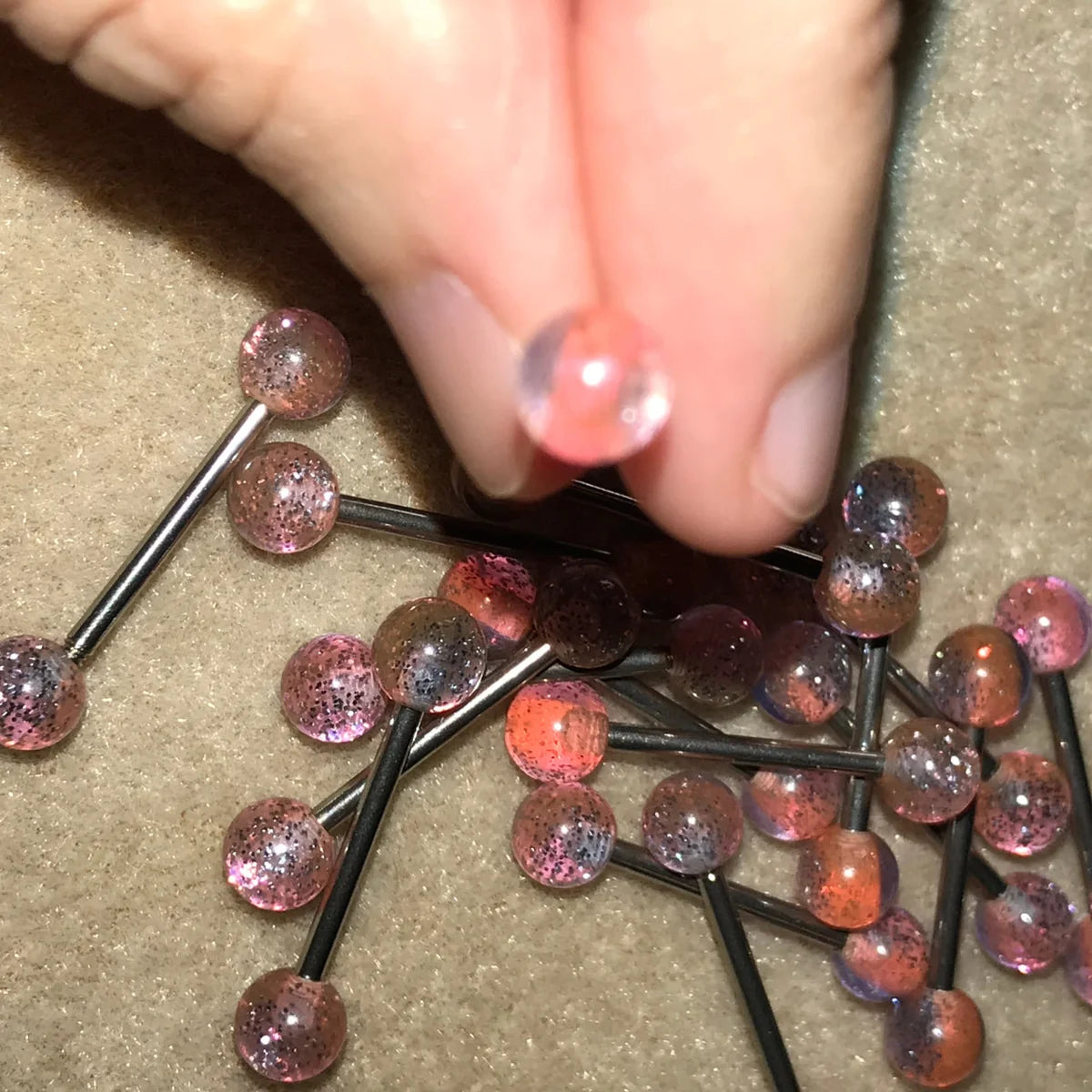 14 Gauge Pink, orange, and purple with silver glitter, stripe Design Tongue Ring.