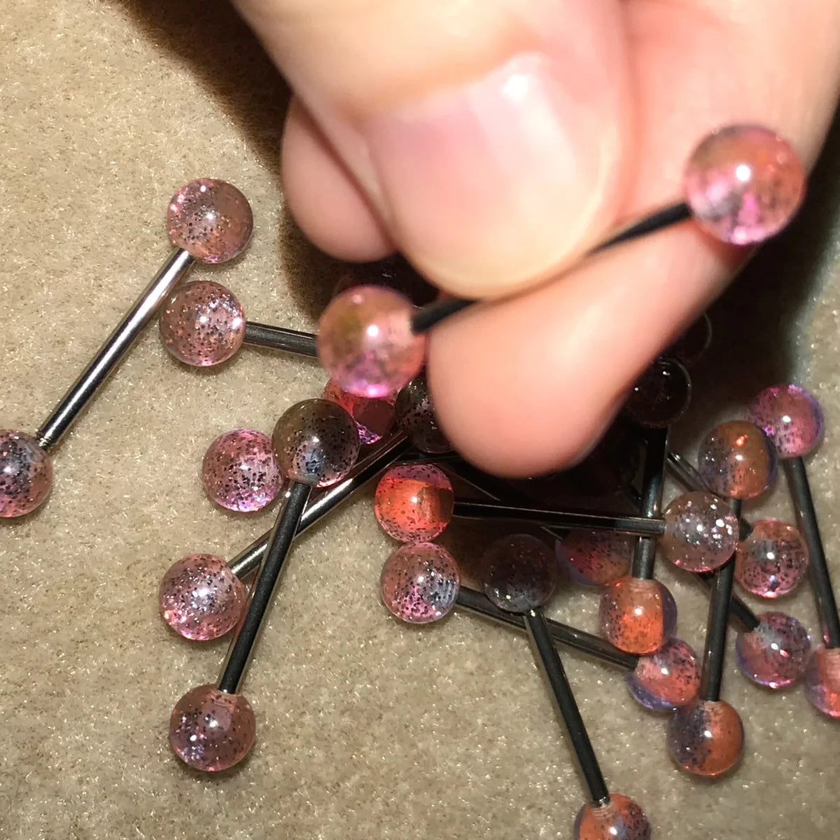 14 Gauge Pink, orange, and purple with silver glitter, stripe Design Tongue Ring.