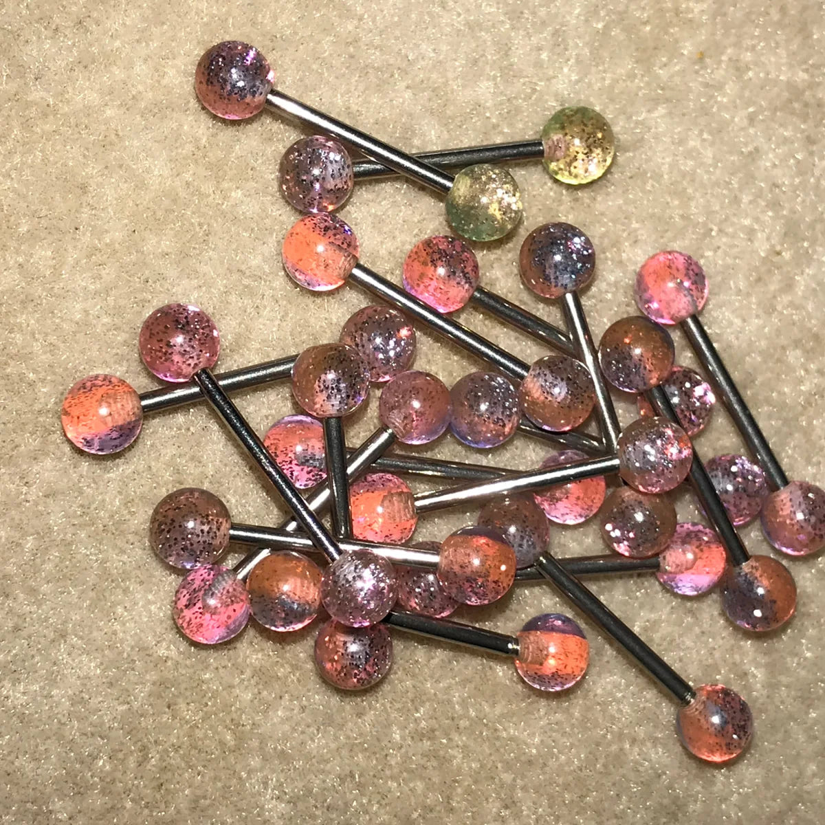 14 Gauge Pink, orange, and purple with silver glitter, stripe Design Tongue Ring.