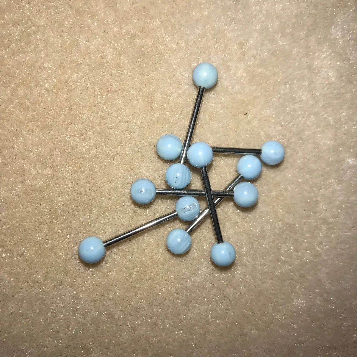 14 Gauge Light Blue, clear and glitter striped Tongue Ring