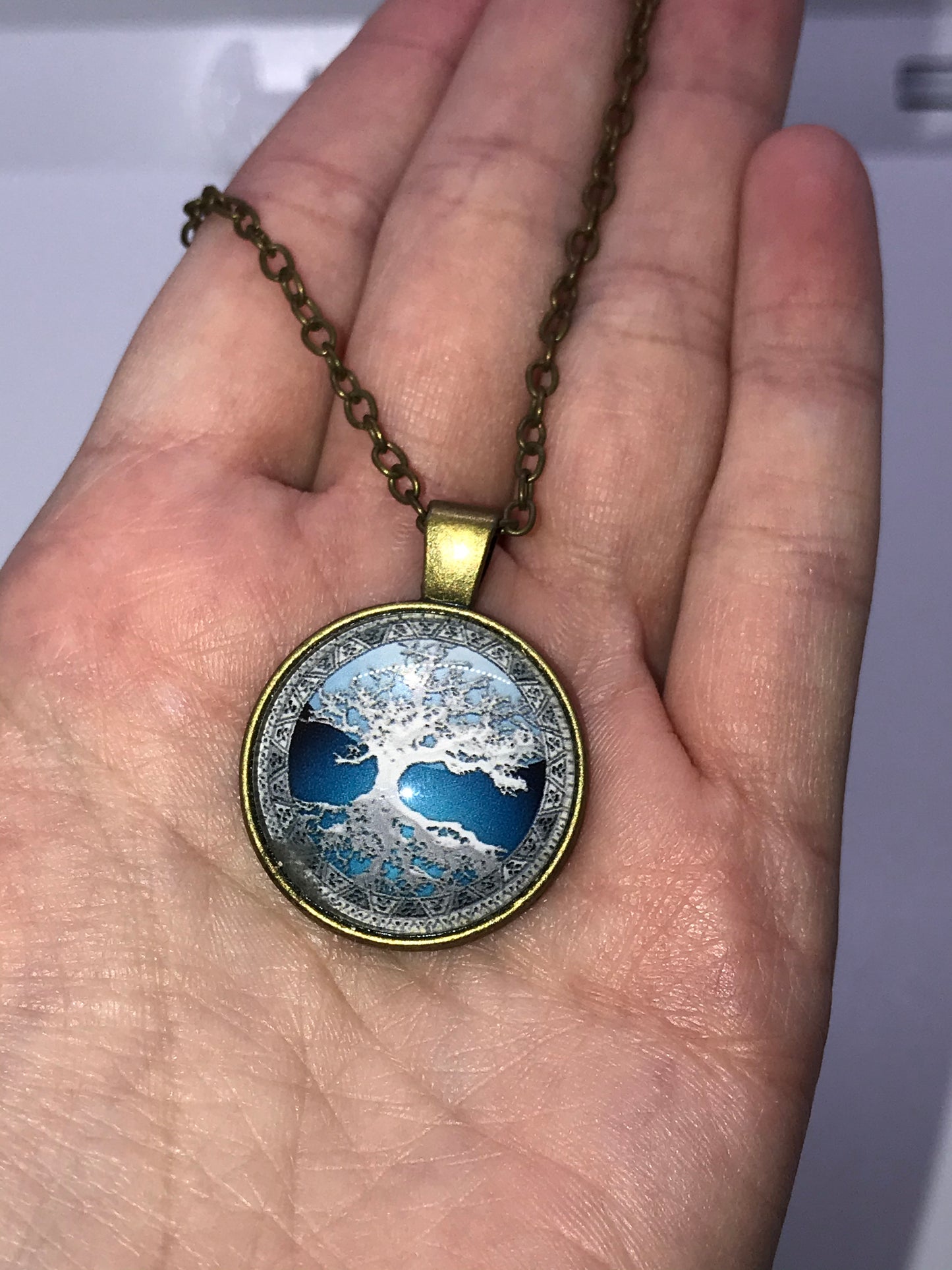 18" Blue Tree and Reflection Brass Necklace