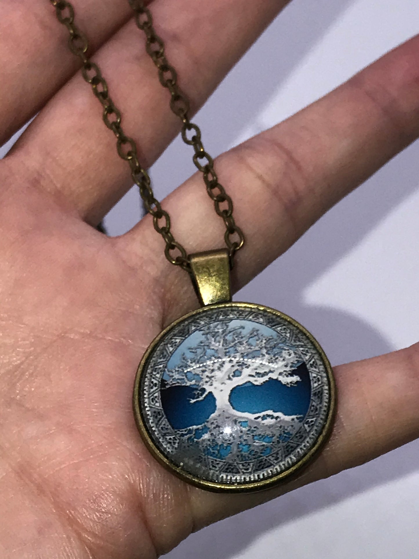 18" Blue Tree and Reflection Brass Necklace