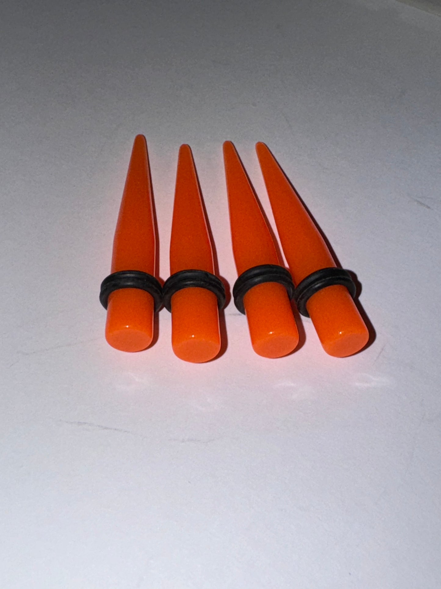 0 Gauge Glow-In-The-Dark UV Acrylic Gauging Tapers