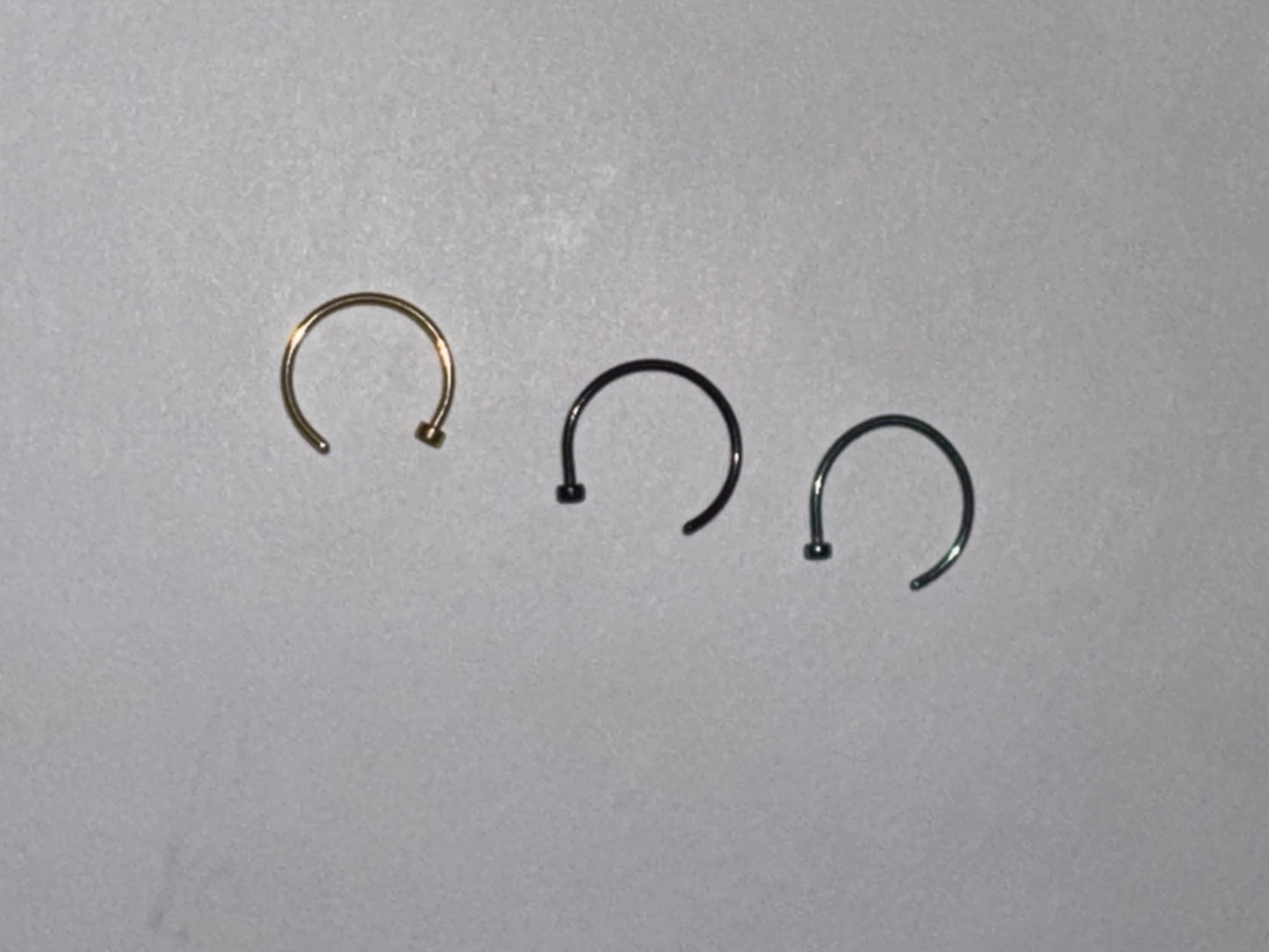 5/16 20 Gauge Titanium Plated Hoop Nose Rings