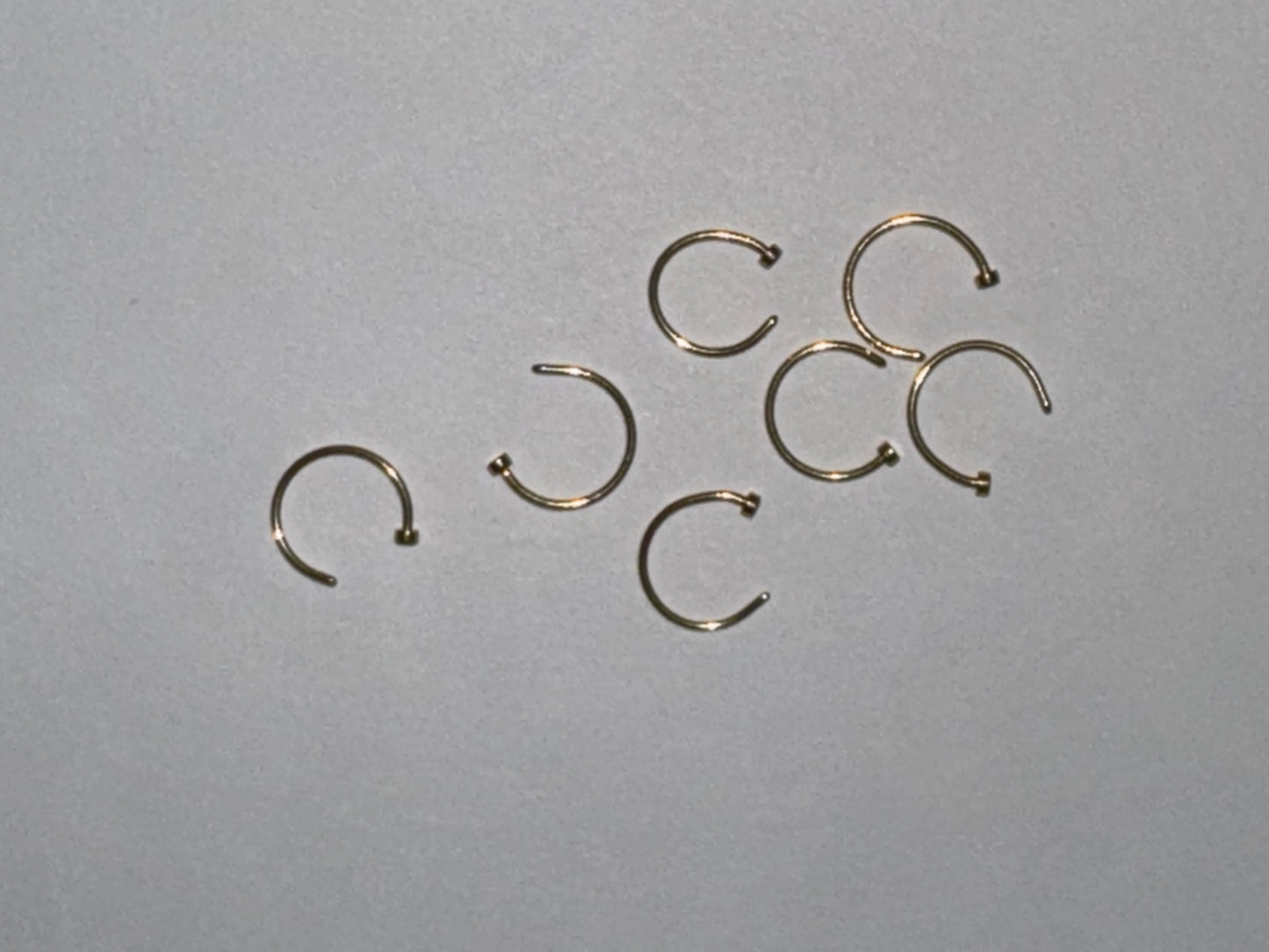 5/16 20 Gauge Titanium Plated Hoop Nose Rings