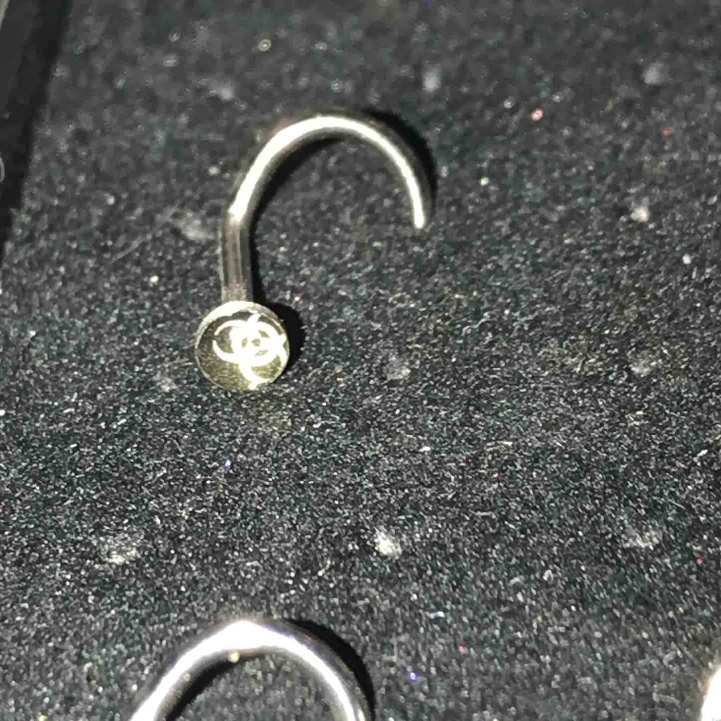 Black and White Biohazard 18 Gauge C-shaped Nose Ring