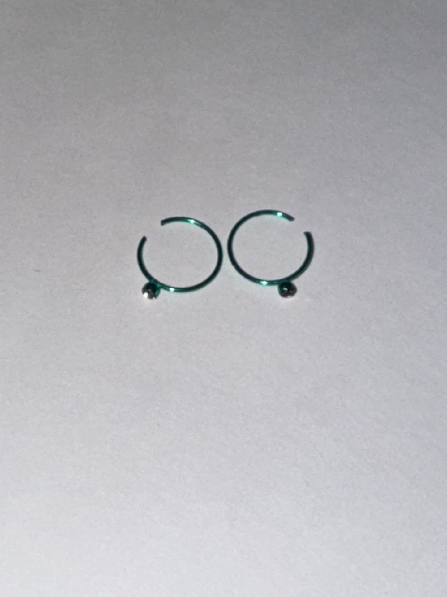 Colorful 22 Gauge Titanium Plated Hoop Nose Rings