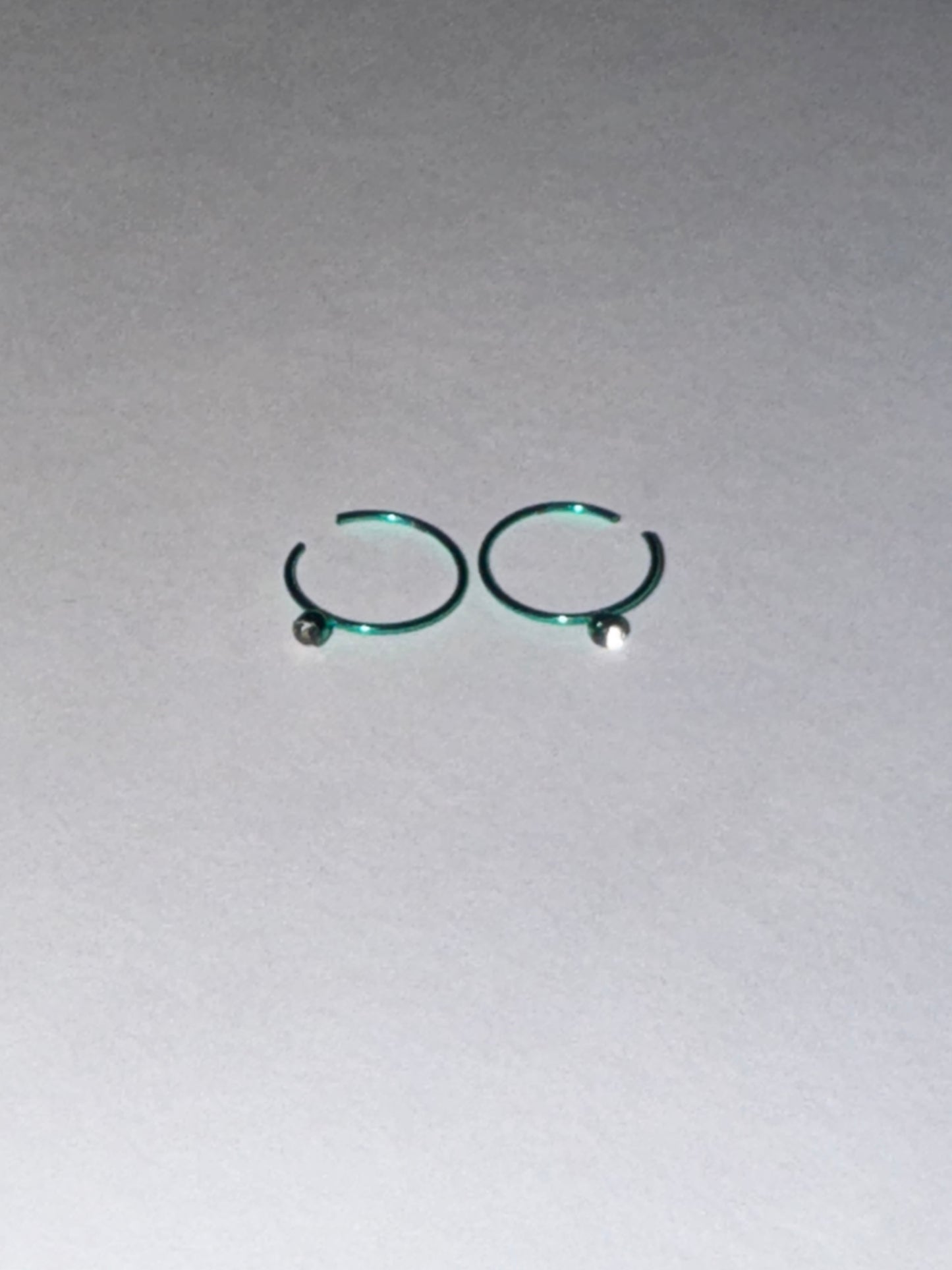 Colorful 22 Gauge Titanium Plated Hoop Nose Rings