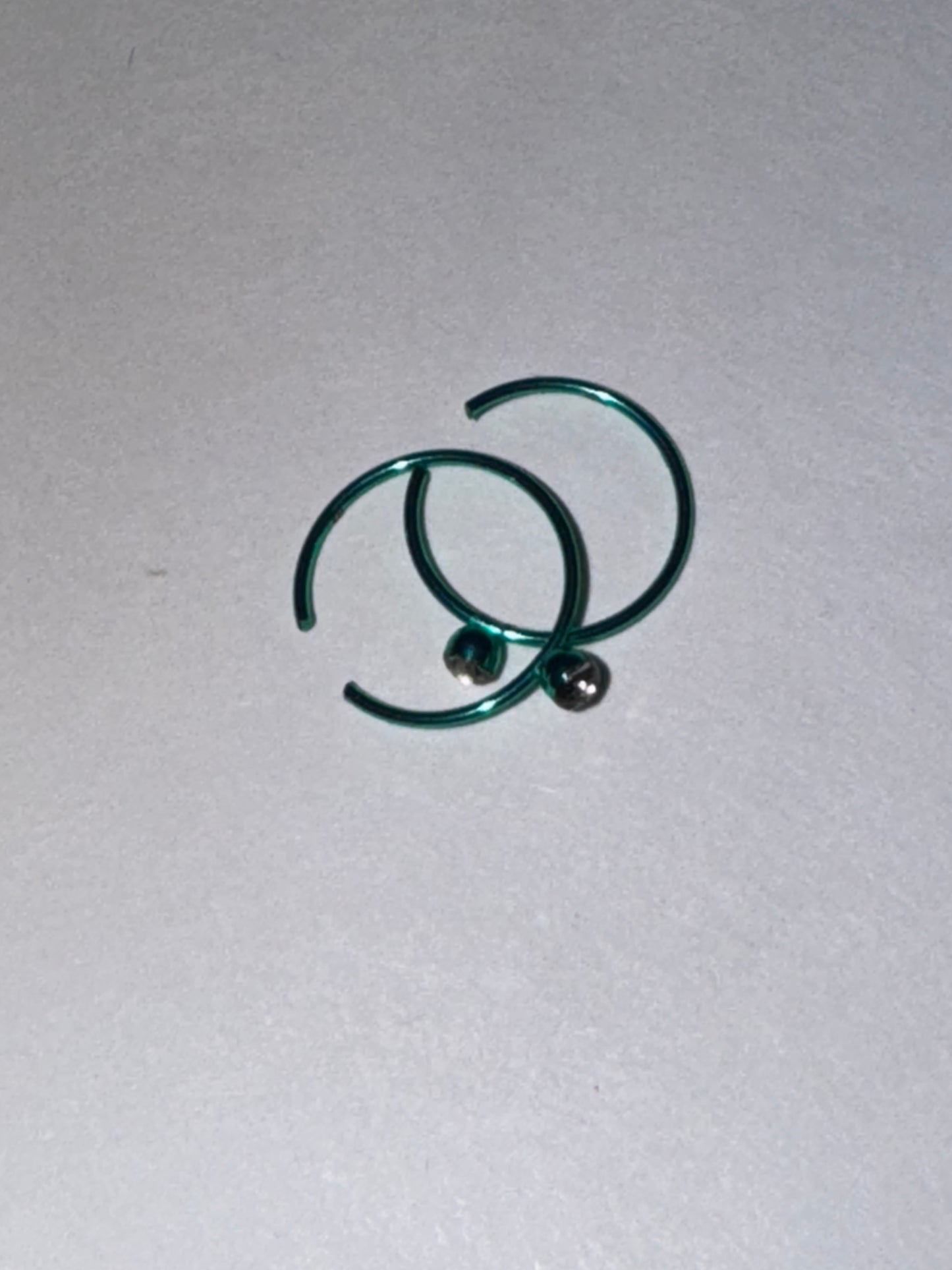 Colorful 22 Gauge Titanium Plated Hoop Nose Rings