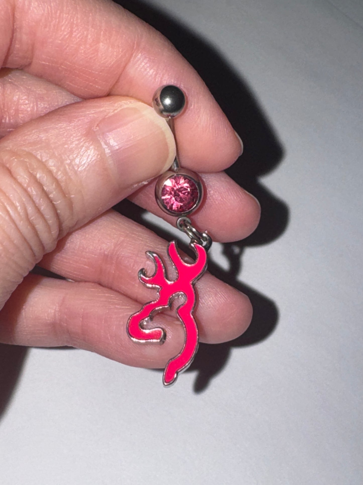 Hot Pink Browning Dangle Belly Ring with a Pink Gem