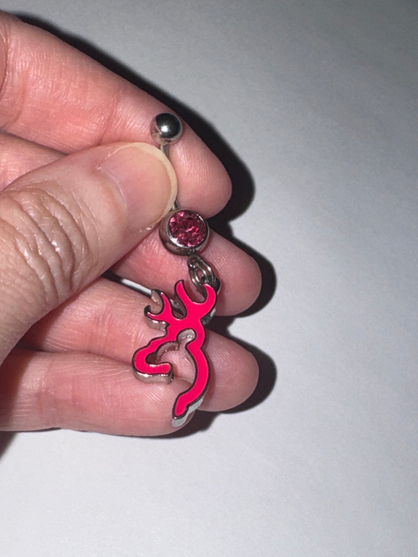 Hot Pink Browning Dangle Belly Ring with a Pink Gem