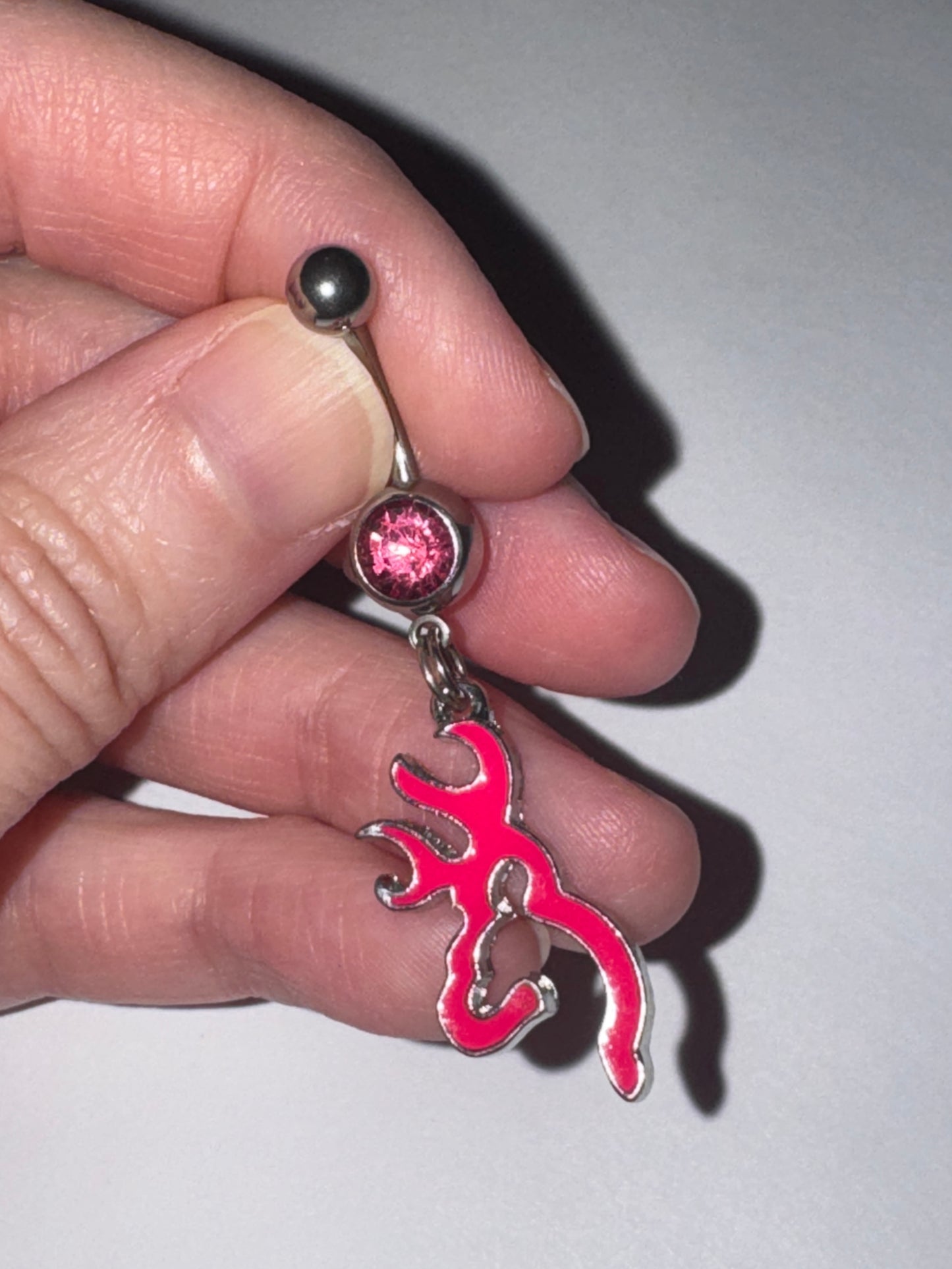 Hot Pink Browning Dangle Belly Ring with a Pink Gem