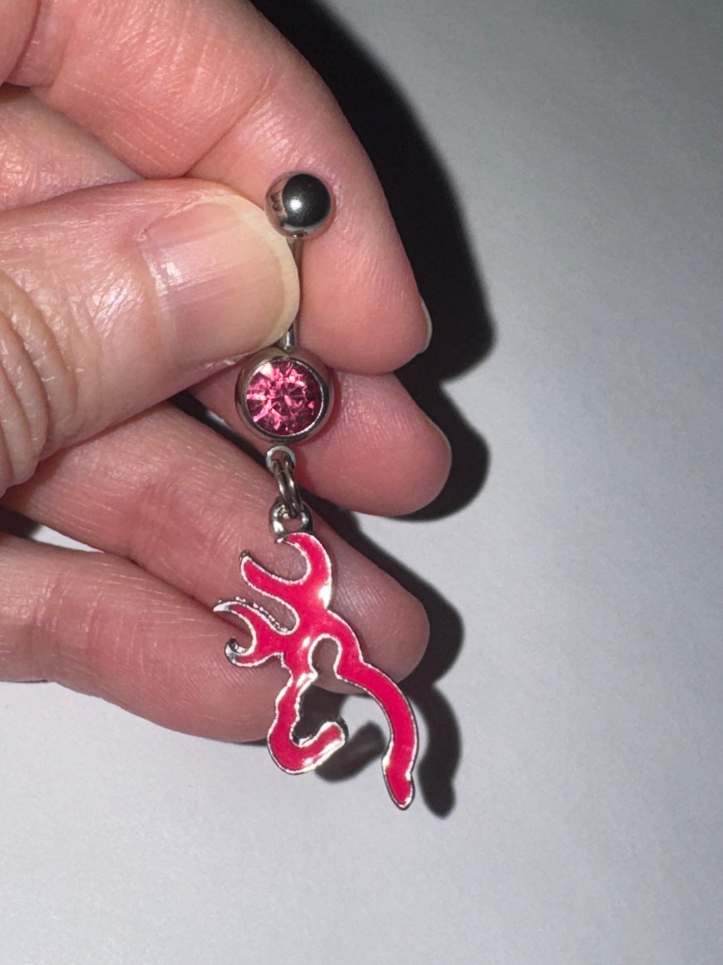 Hot Pink Browning Dangle Belly Ring with a Pink Gem