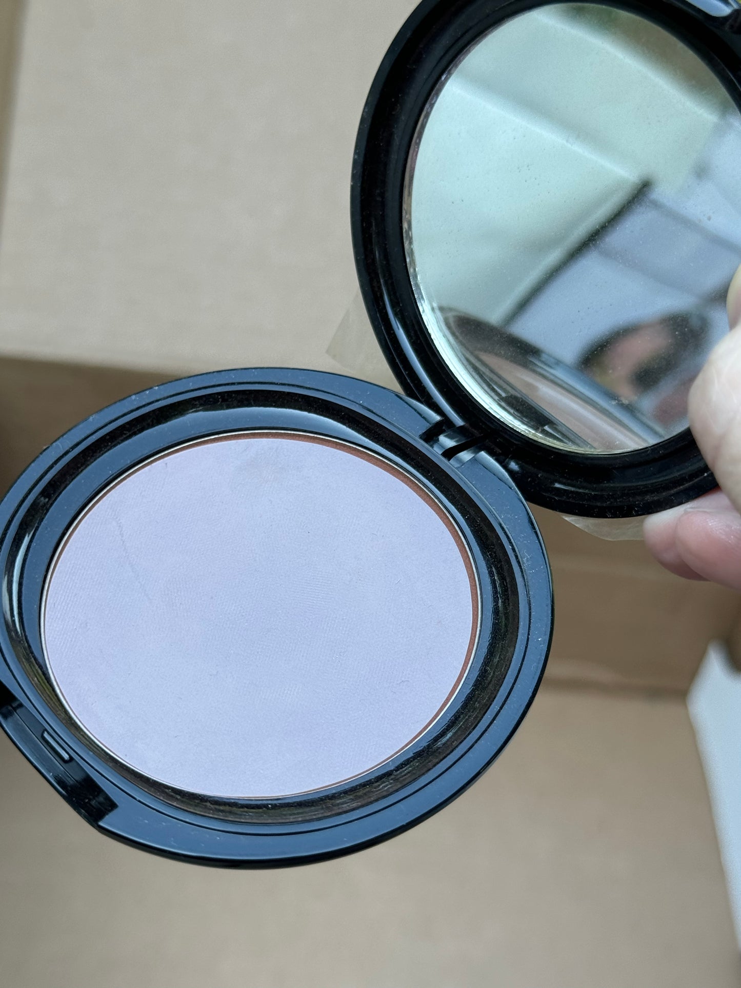 OSP Cosmetics Photochromatic Pressed Powder in Cocoa Bean