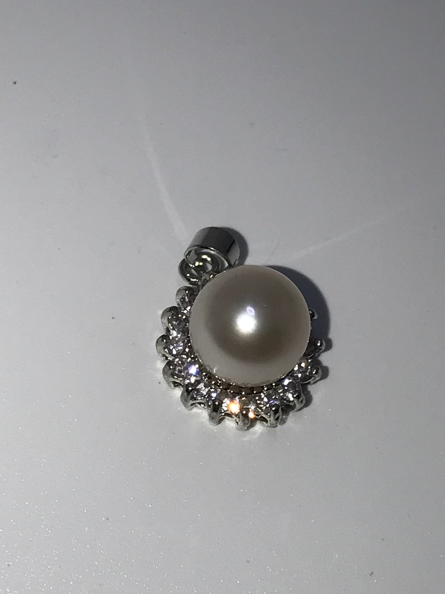 3/4" Silver Orange pearl and Cubic Zirconia Pendant