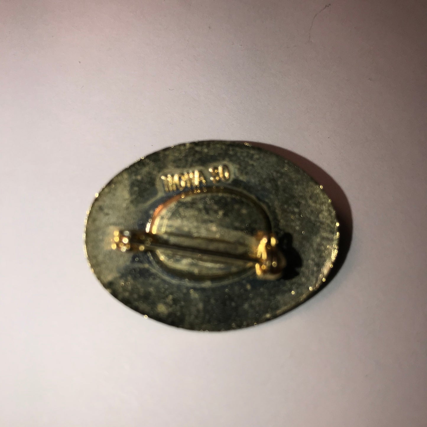 Black and gold Oval Mona So Pin