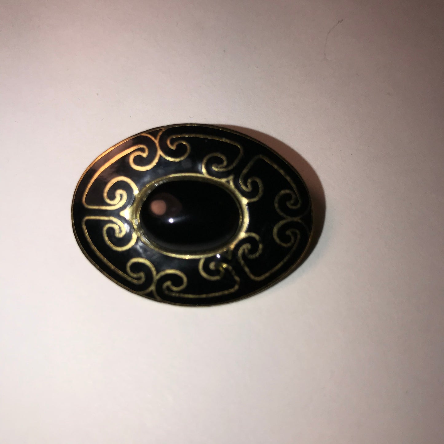 Black and gold Oval Mona So Pin