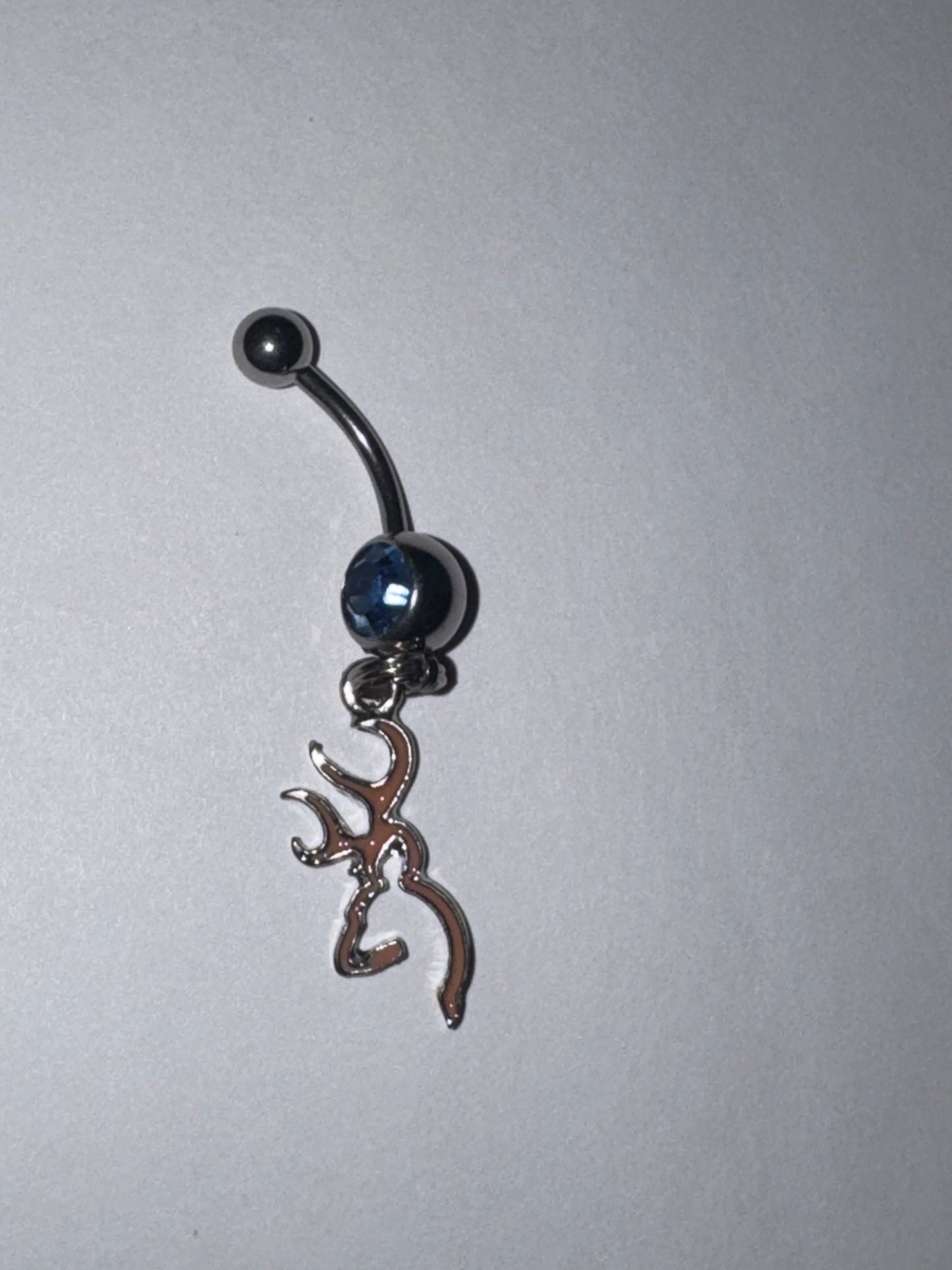 Pink Browning Dangle Belly Ring with a Blue Gem