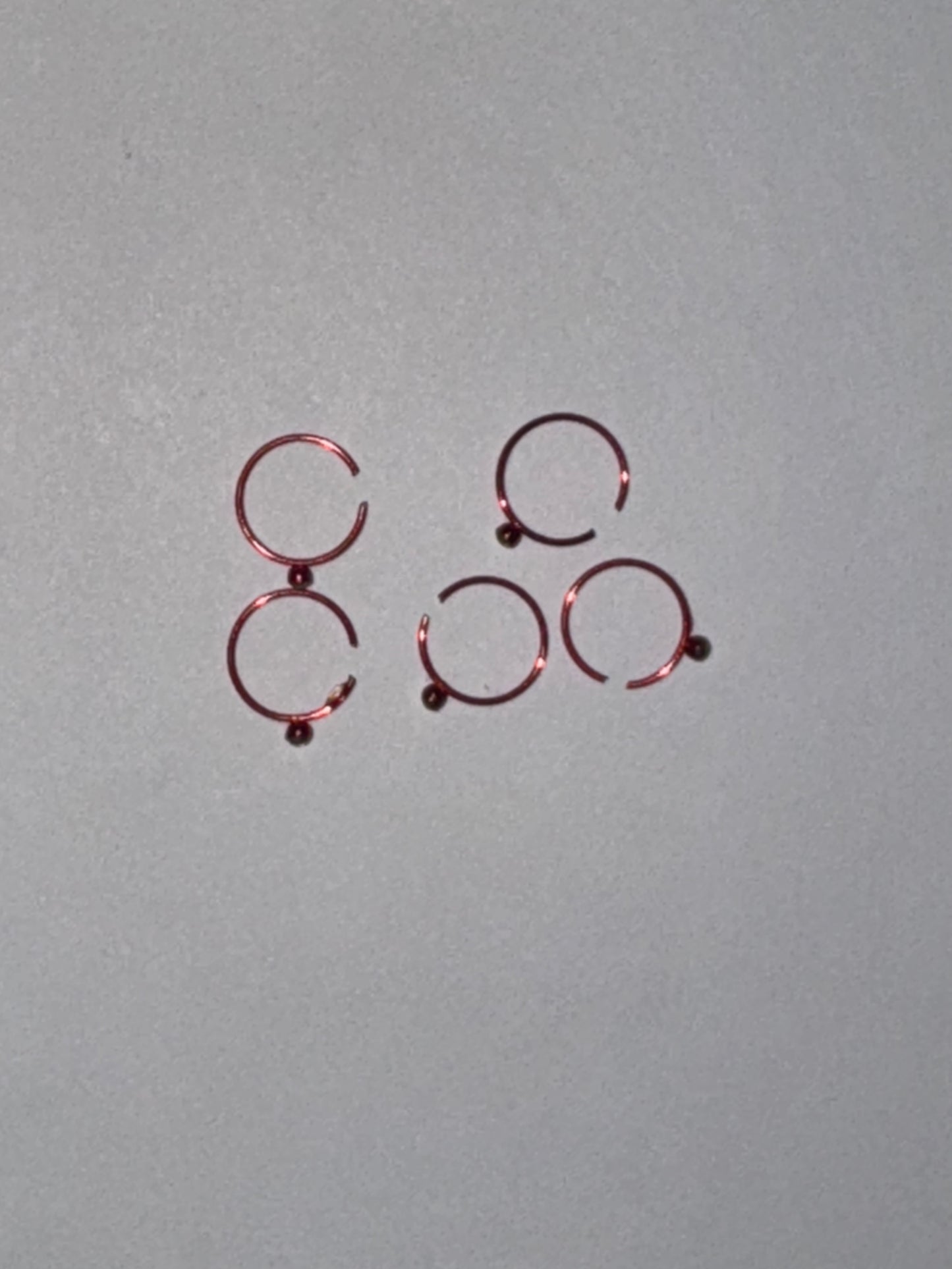 Colorful 22 Gauge Titanium Plated Hoop Nose Rings