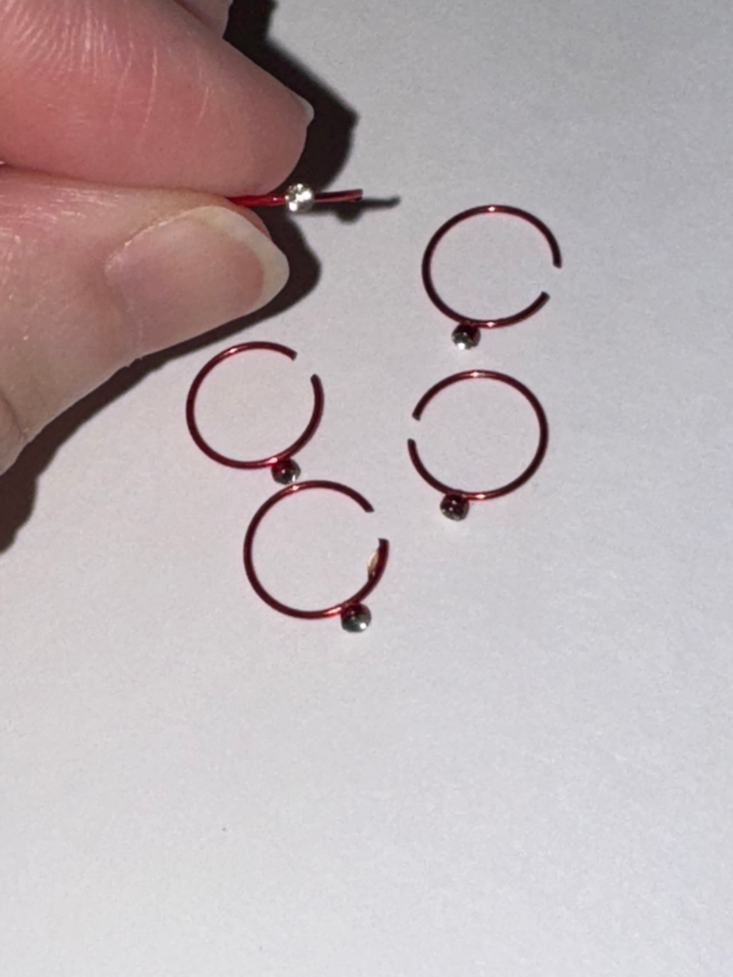 Colorful 22 Gauge Titanium Plated Hoop Nose Rings
