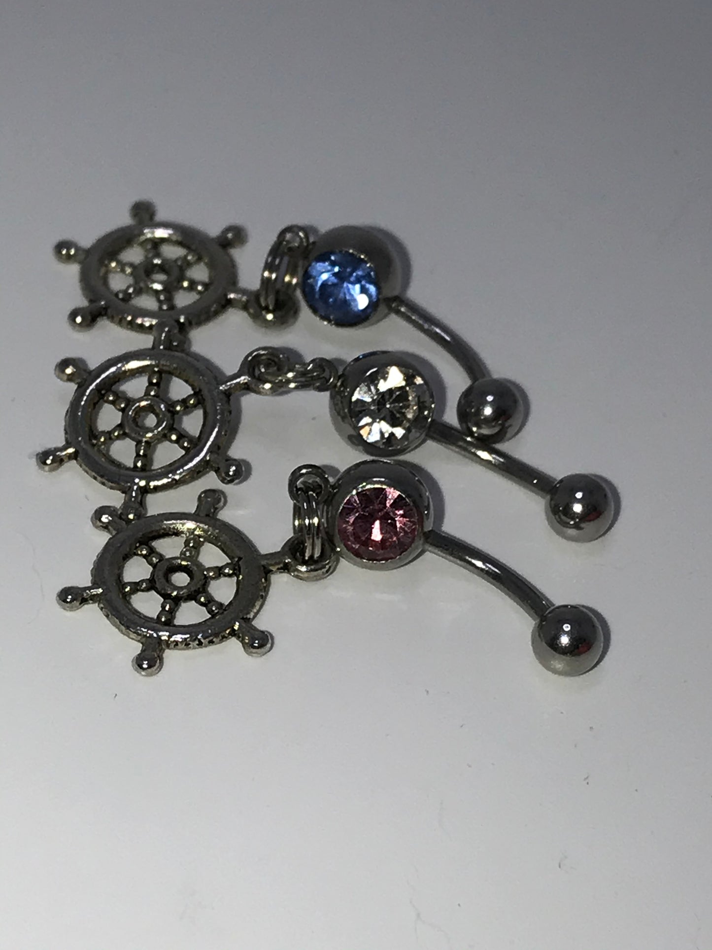 Pink Gem Nautical Wheel Design Dangle Belly Ring