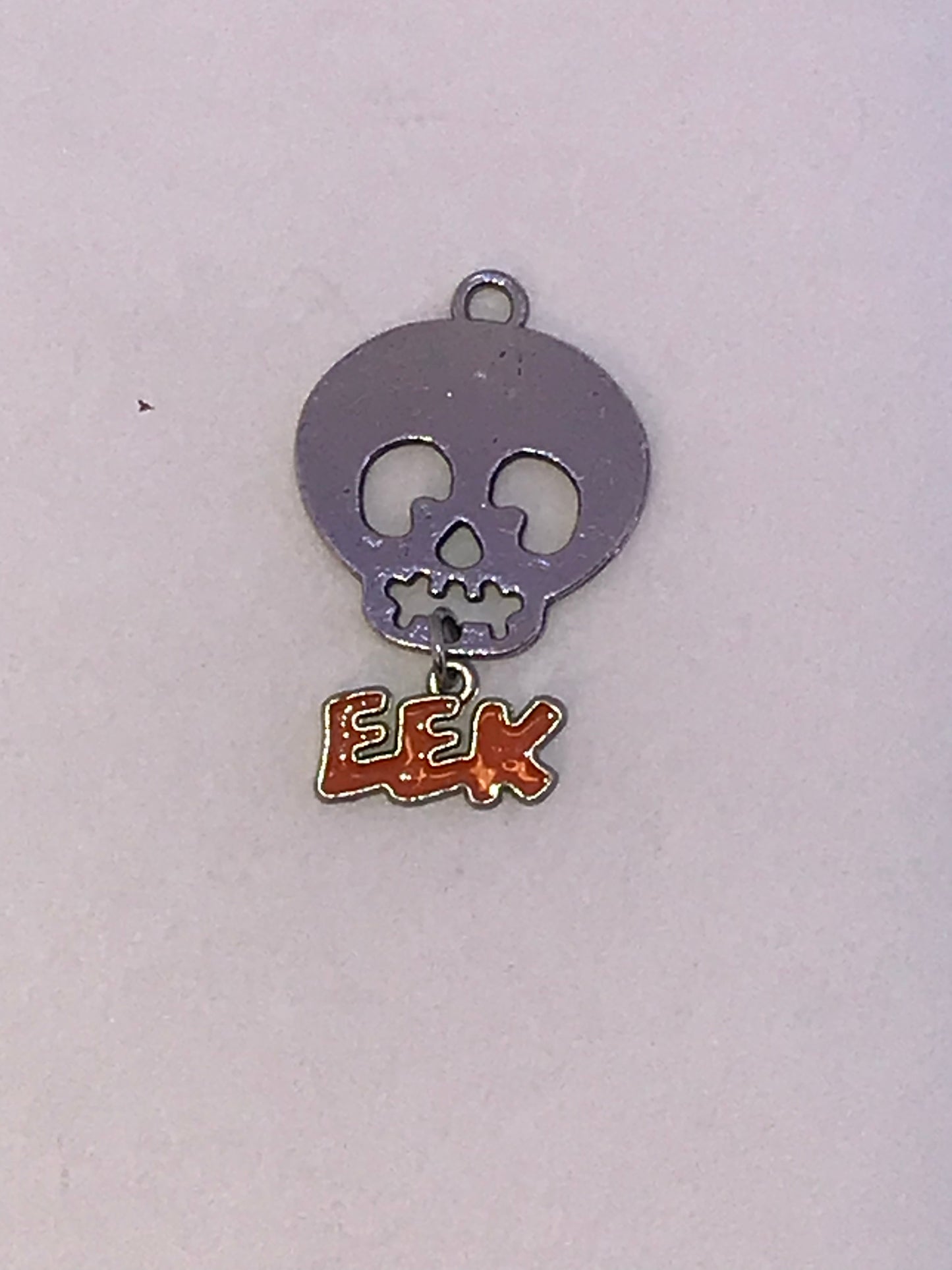 Skull with Eek dangle Charm