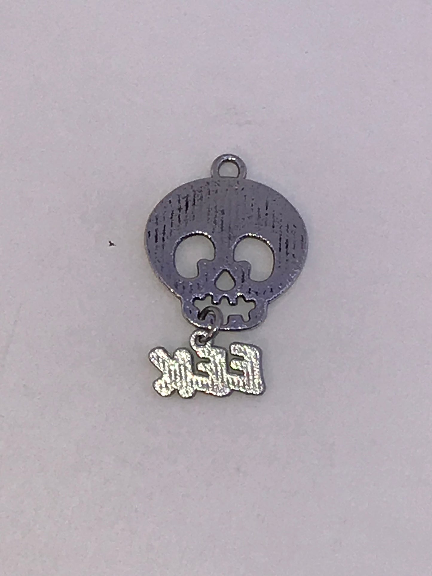 Skull with Eek dangle Charm