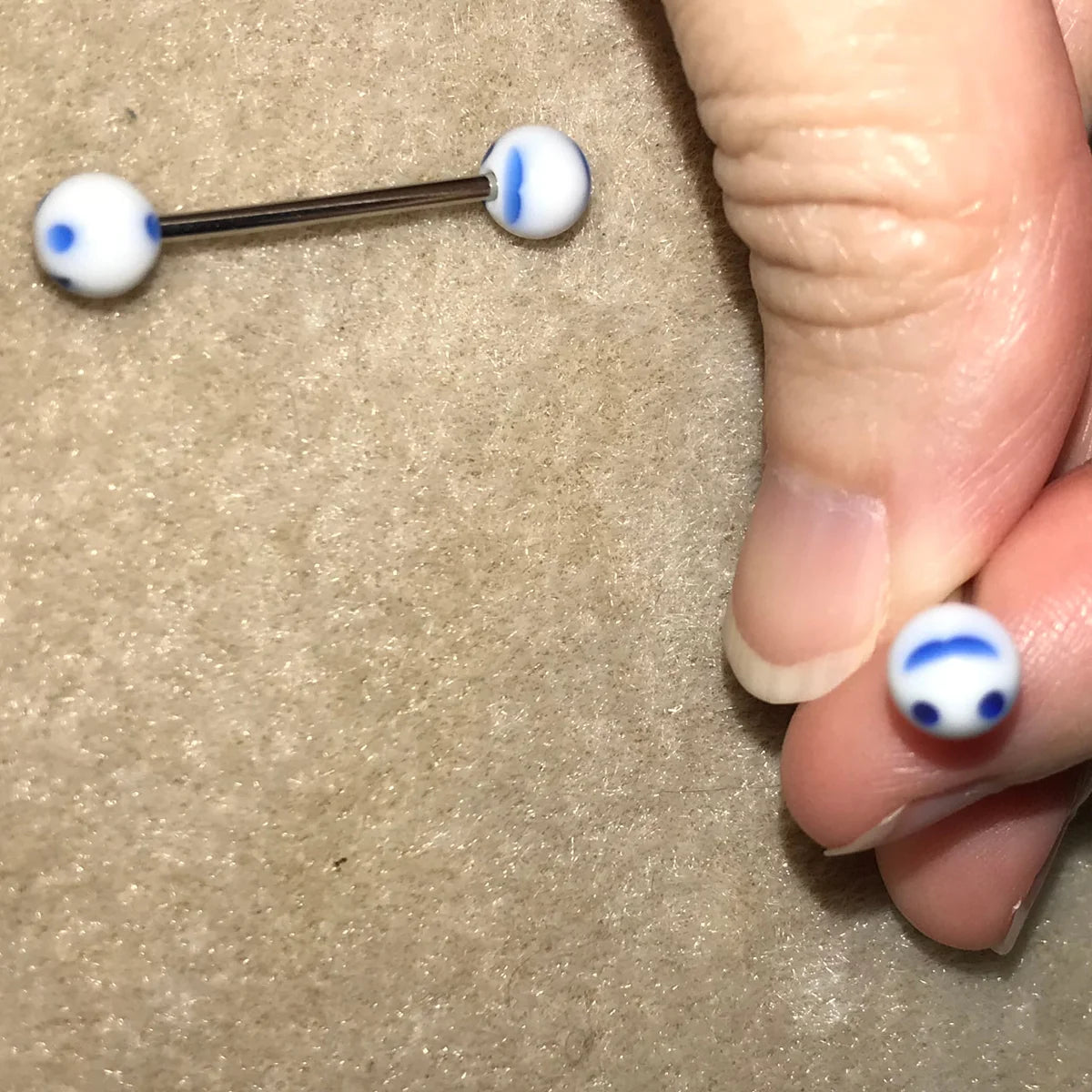 14 Gauge White and Blue Smiley Face Tongue Ring