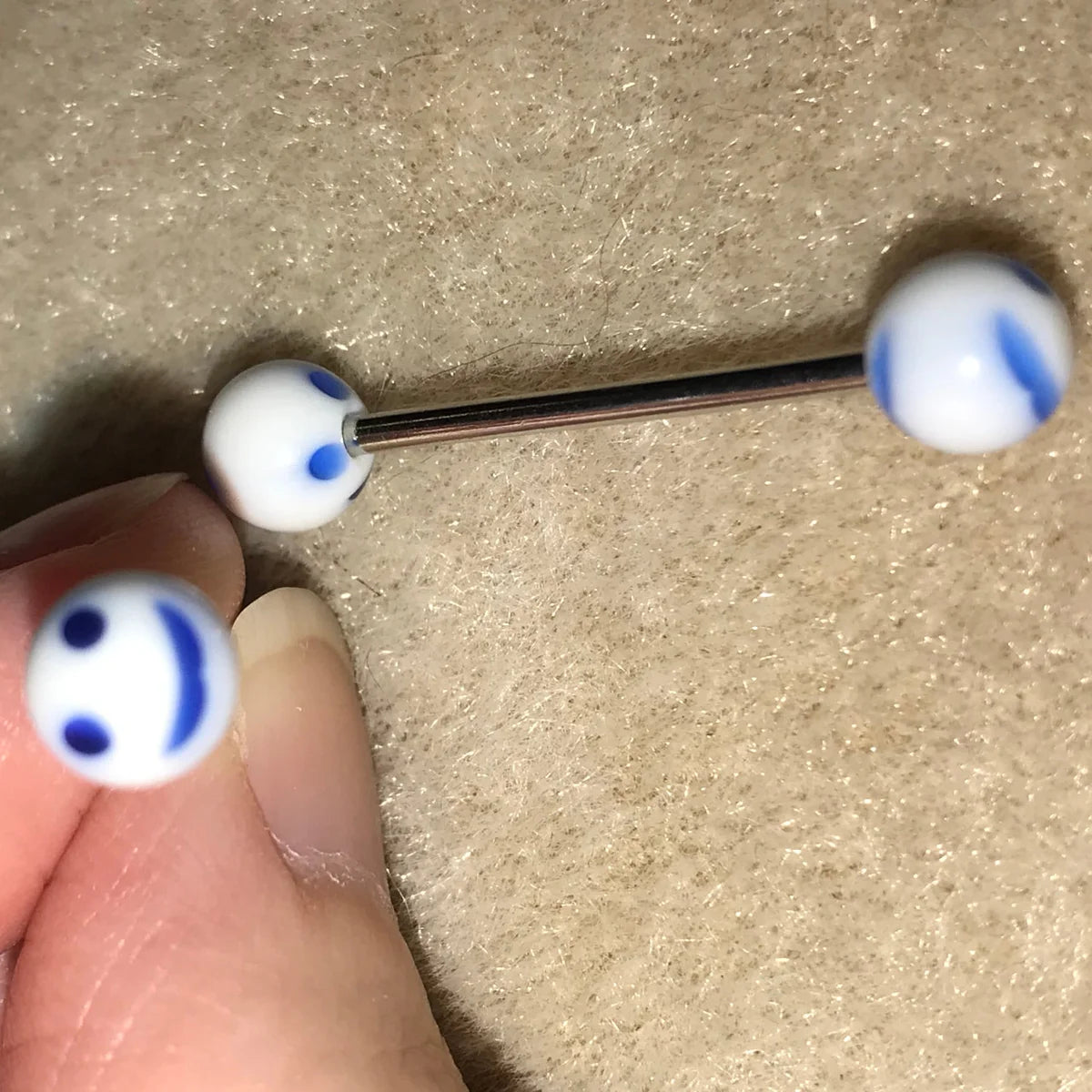 14 Gauge White and Blue Smiley Face Tongue Ring