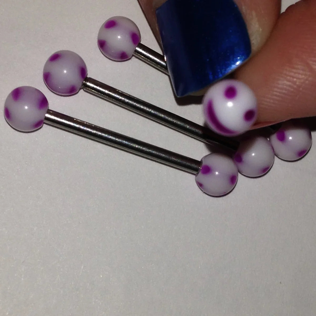 14 Gauge White and Purple Smiley Face Tongue Ring