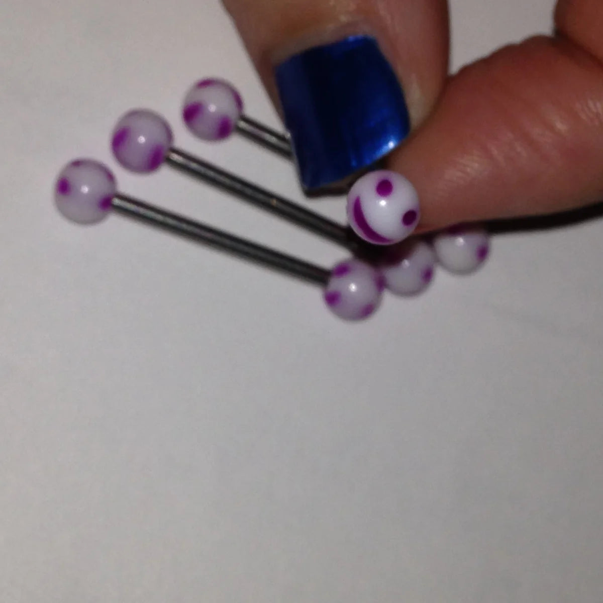 14 Gauge White and Purple Smiley Face Tongue Ring