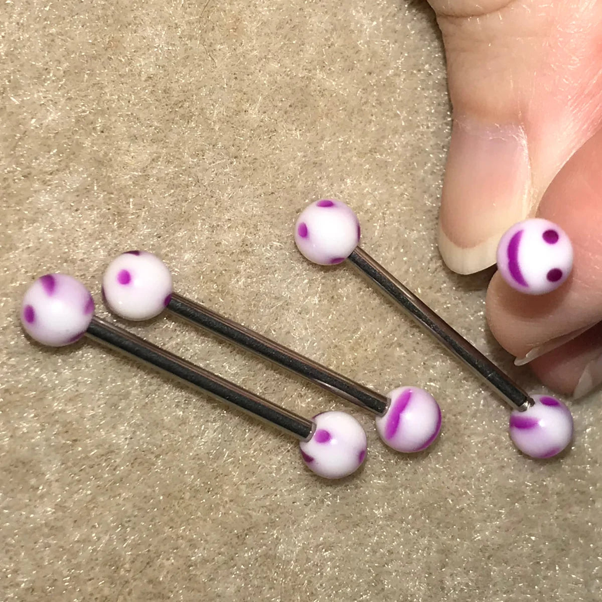 14 Gauge White and Purple Smiley Face Tongue Ring
