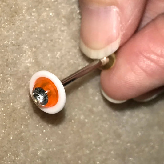 14 Gauge Orange and white with Clear Rhinestone Space Ship Tongue Ring