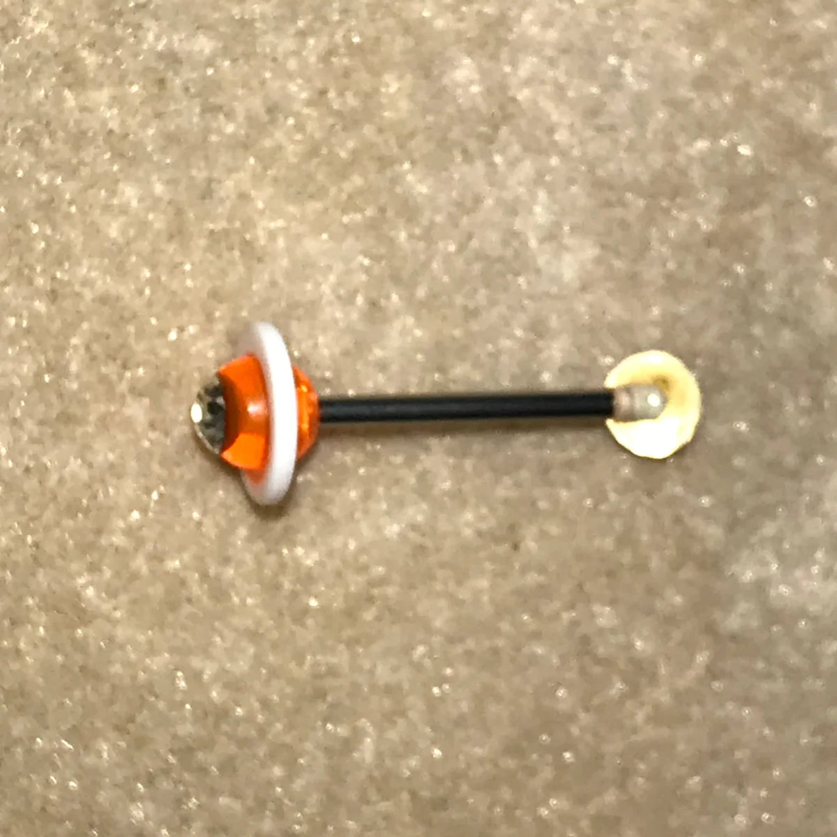 14 Gauge Orange and white with Clear Rhinestone Space Ship Tongue Ring