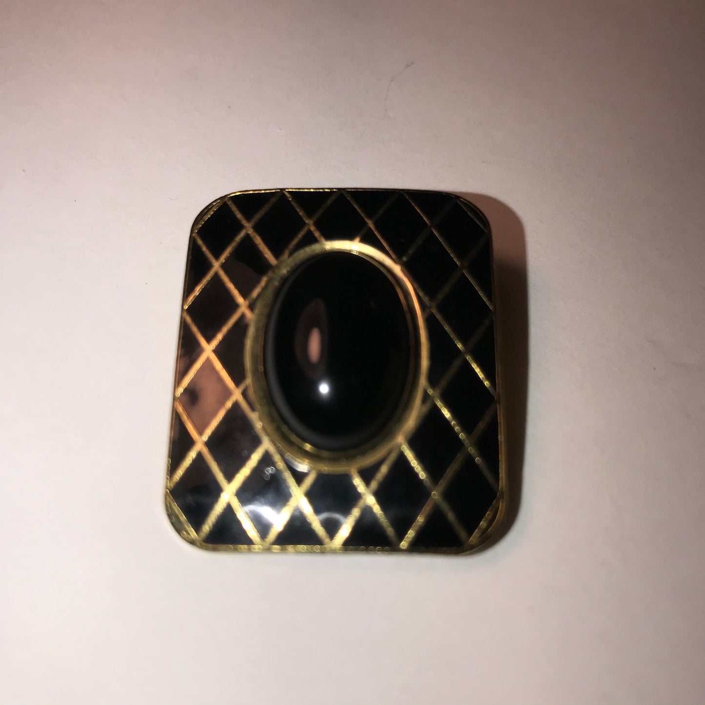 Rectangular Black and gold Mona So Pin